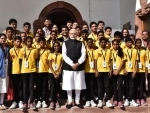 Narendra Modi with a group of underprivileged students