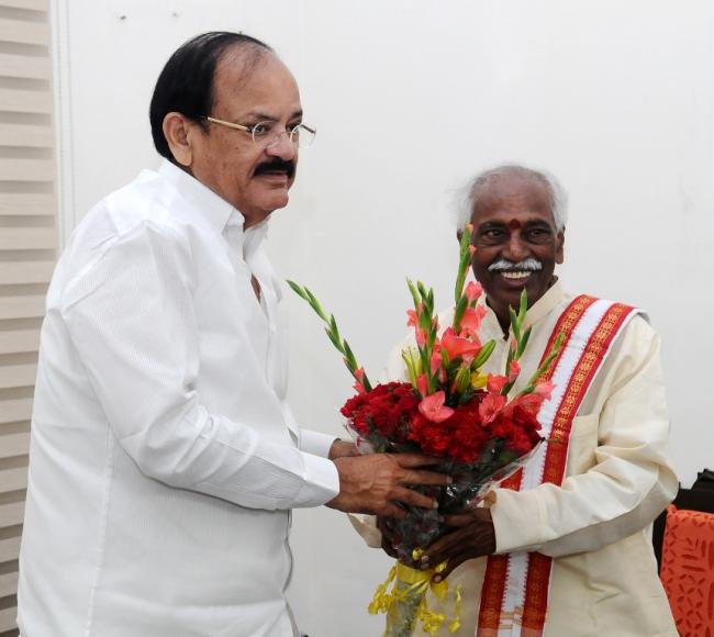 Labour minister and other central government officials call on Vice President of India