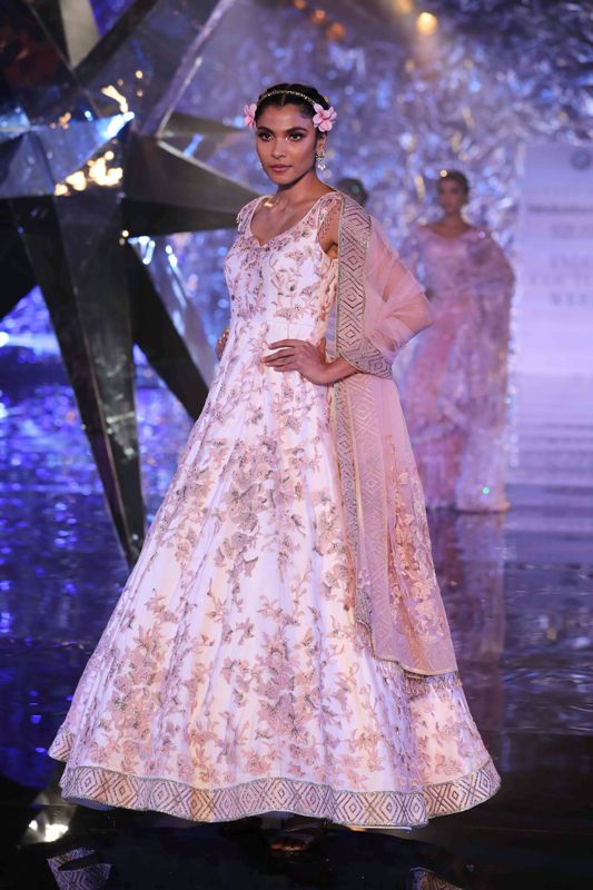 Models walk for Suneet Varma in India Couture Week