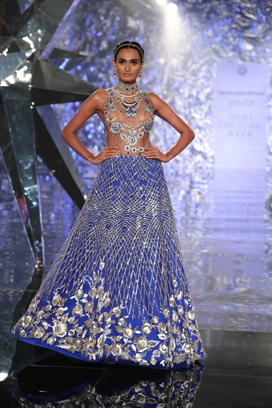 Models walk for Suneet Varma in India Couture Week