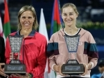 Makarova and Hradecka pose with trophy