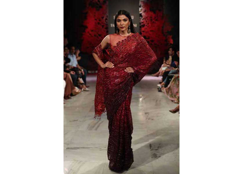Models walk the ramp for Tarun Tahiliani's show