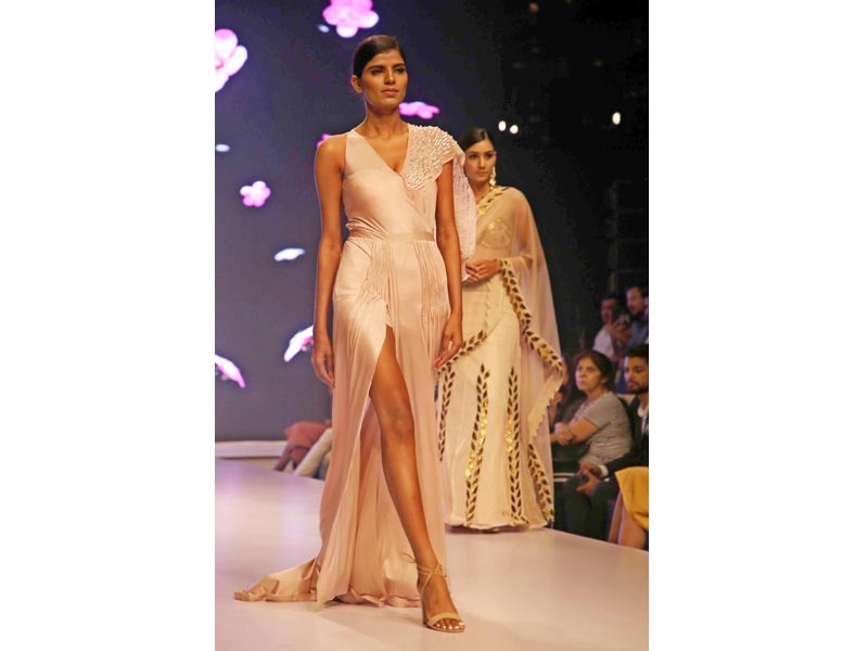 Models walk the ramp at fashion show in New Delhi
