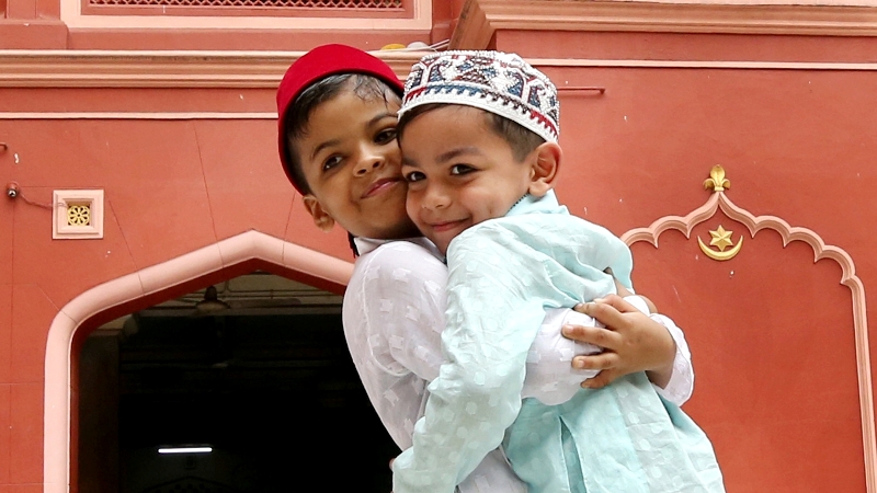 Muslims offer prayers on Eid outside a Kolkata mosque