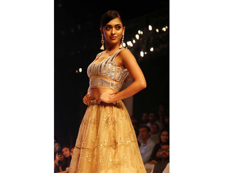 Models walk the ramp at fashion show in New Delhi