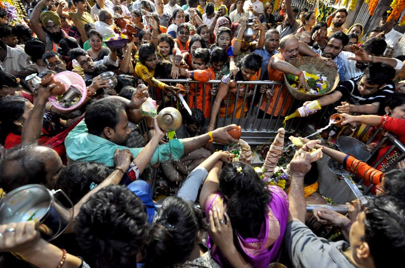People gather in large numbers at temple for Maha Shivaratri