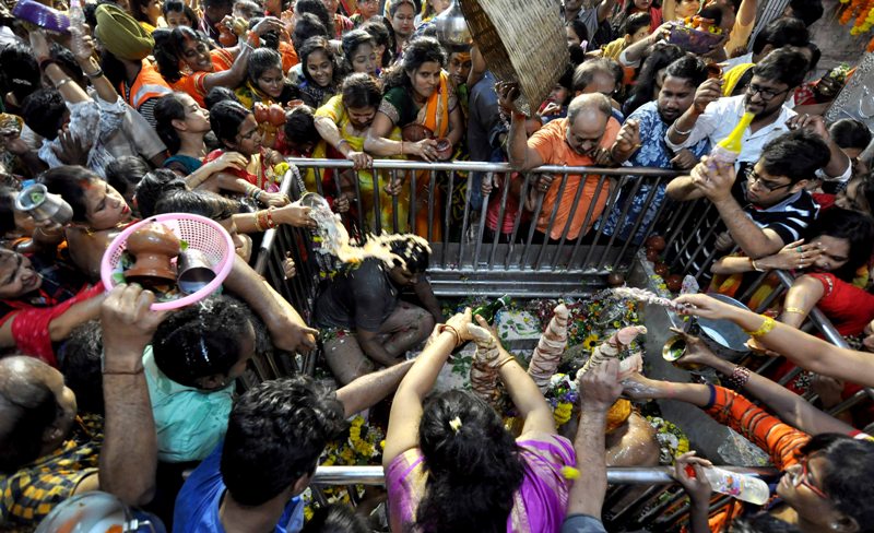 People gather in large numbers at temple for Maha Shivaratri