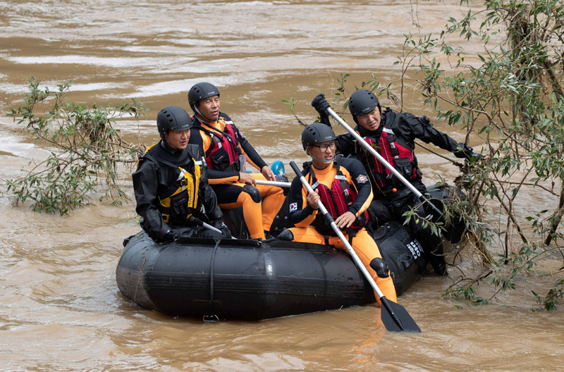South Korean soldiers search for people swept away by strong current in Chuncheon