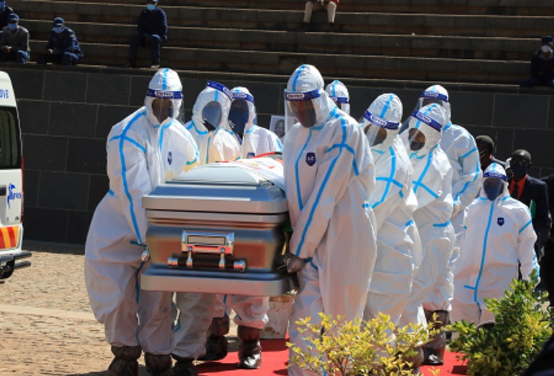 Casket of late Zimbabwean Agriculture Minister Perrance Shiri carried during burial