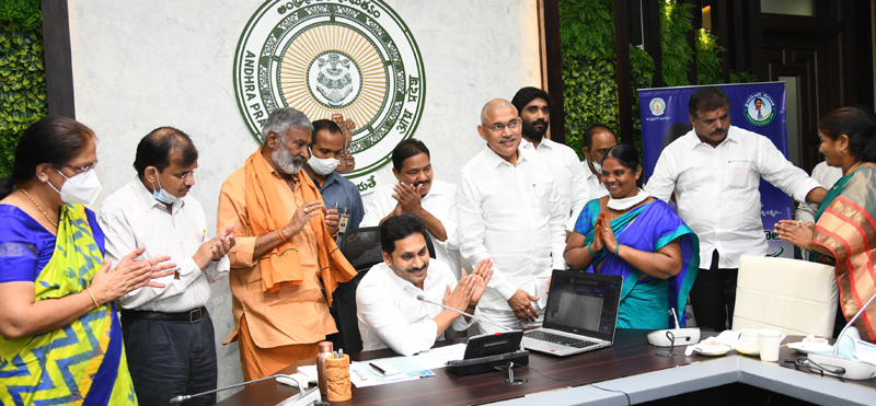 Andhra Pradesh Chief Minister Y S Jagan Monhan Reddy releasing Cheque