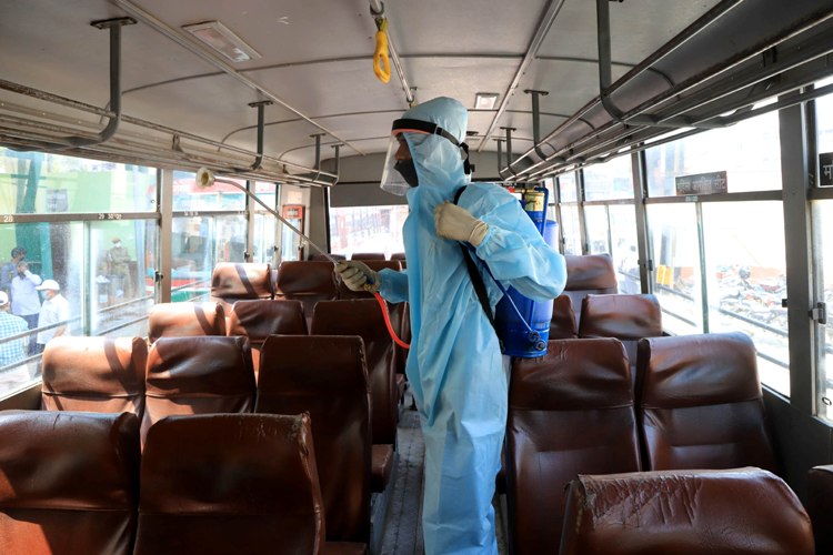 Buses to carry migrant workers get disinfected