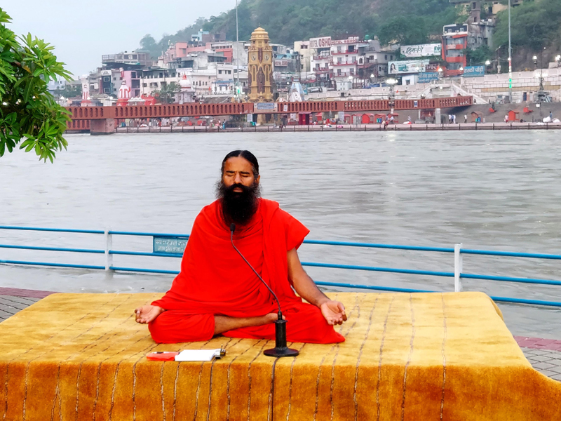 Haridwar: Yoga Guru Swami Ramdev rehearsing Yoga