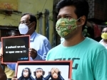 Protest against burning of Covid dead bodies in Mumbai