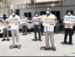 Telangana: CPI members protest demanding TIMS Gacchibowli to admit Covid Patients