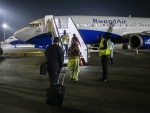 Passengers board RwandAir flight at Kigali as Rwanda opened commercial flights from Aug 1