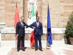 Chinese State Councilor, Foreign Minister Wang Yi, Italian Foreign Minister Luigi Di Maio pose for photos in Rome