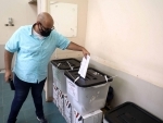 Egypt election: Man votes in polling station in Cairo