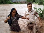 Jammu: A policeman rescuing a woman trapped in river Ujh