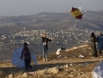 People flying kites on Eid in West Bank city of Nablus
