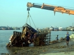 Cleansing drive of Ganges after Durga idol immersion