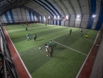 People play soccer at am indoor stadium in Istanbul