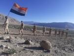 Indian border guards walk with the tricolour in Ladakh near Chinese border on I-Day