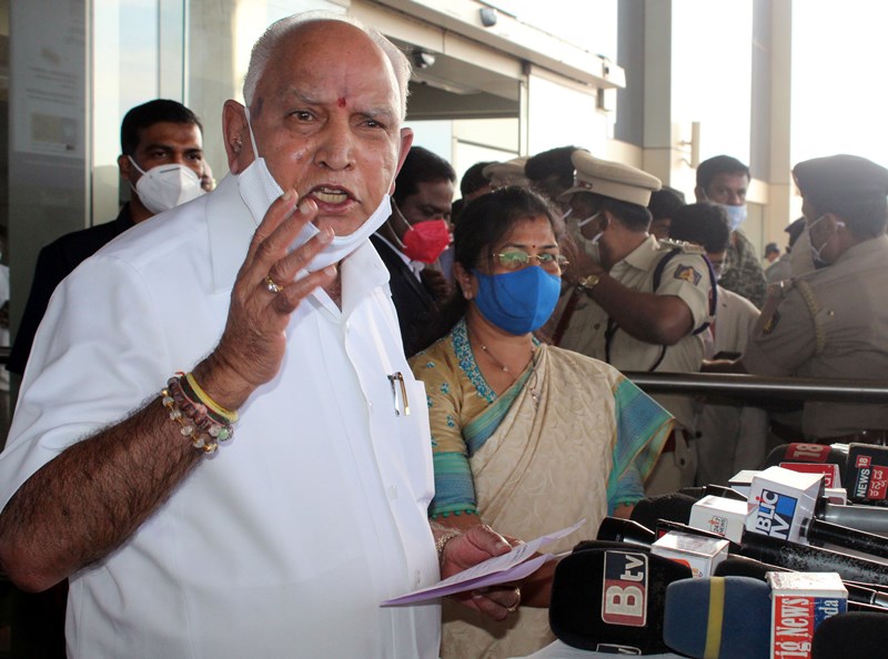 Karnataka CM B S Yeddyurappa speaks to media persons at Sambra Airport in Belagavi