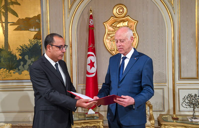 Tunisian Prime Minister-designate Hichem Mechichi presents his proposed composition for new government to Tunisian President Kais Saied