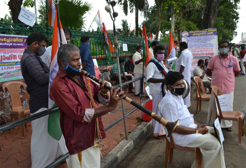 Travancore Devaswom Employees Front members staging dharna