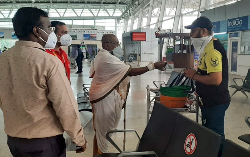 Distribution of face masks in Chennai airport