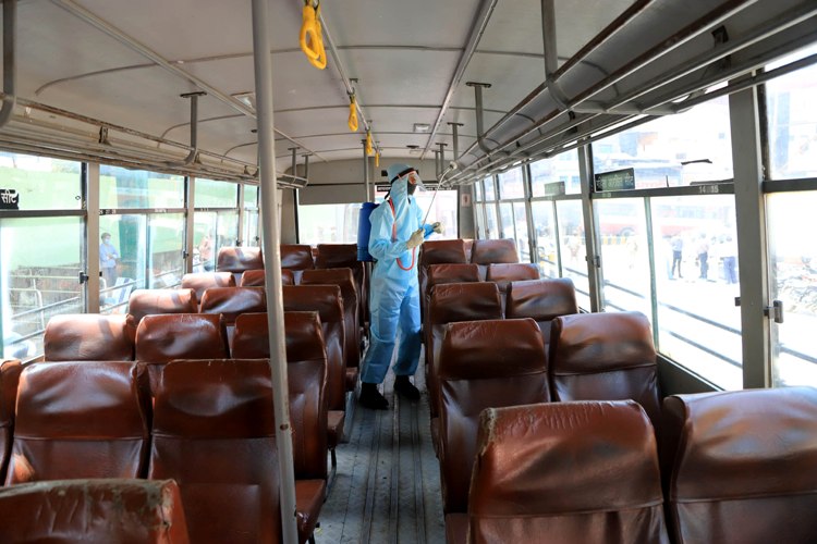 Buses to carry migrant workers get disinfected