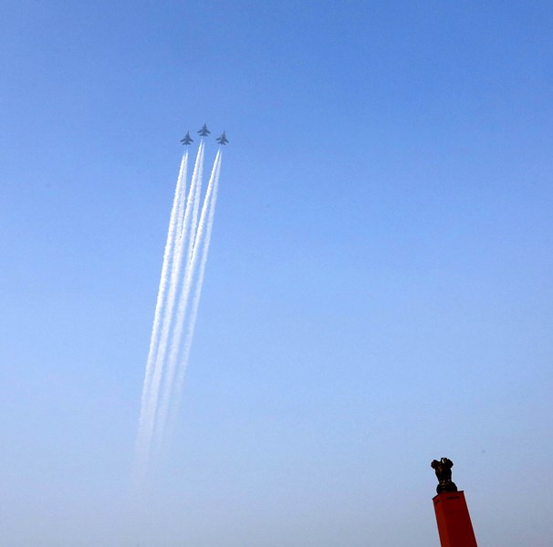 Three Sukhoi fighter aircraft fly past National War Memorial marking the beginning of Golden Jubilee of India's victory over Pakistan