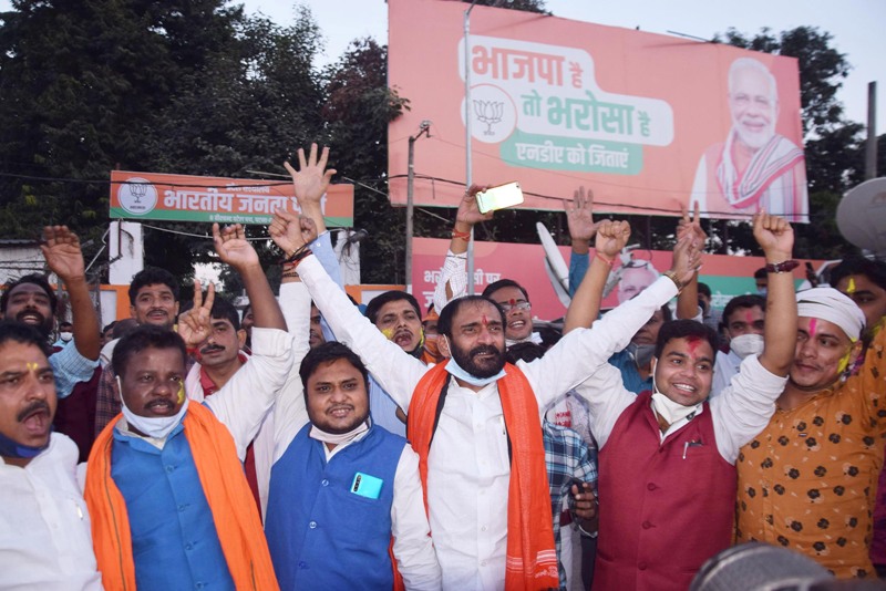 NDA workers celebrate party victory in Bihar Assembly elections in Patna
