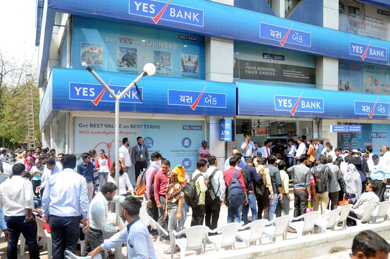Depositors gathered outside Yes Bank branch in Ahmedabad for money withdrawal