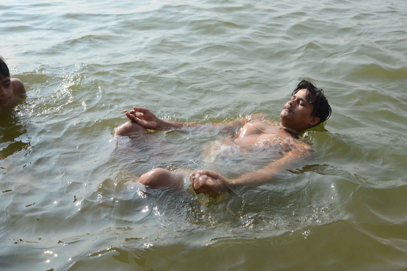 Varanasi: People practise Yoga on Ganges ghat