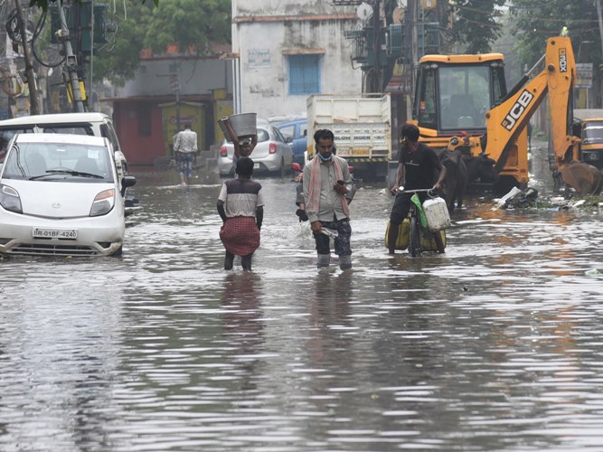 Waterlogged street in Patna makes people suffer