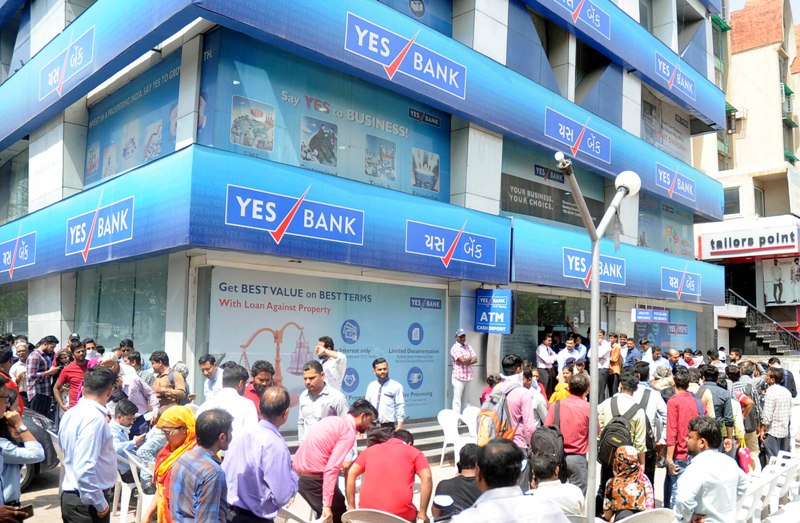 Depositors gathered outside Yes Bank branch in Ahmedabad for money withdrawal