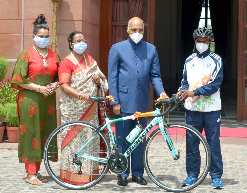 President Ram Nath Kovind gifts racing bike to an aspiring cyclist at Rashtrapati Bhawan