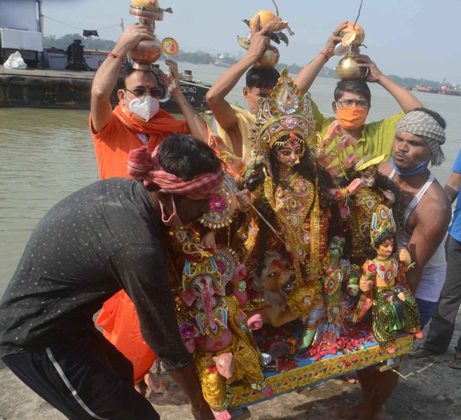 Glimpses of immersion of Goddess Durga's idols at Kolkata's Babughat