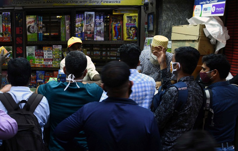 People buy firecrackers for Diwali in Mumbai