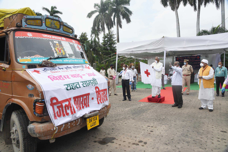 Bihar governor Fagu Chauhan flags off the trucks loaded with relief materials