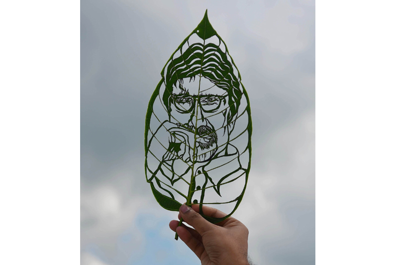 Leaf artist Subham Saha creates Bachchan's portrait