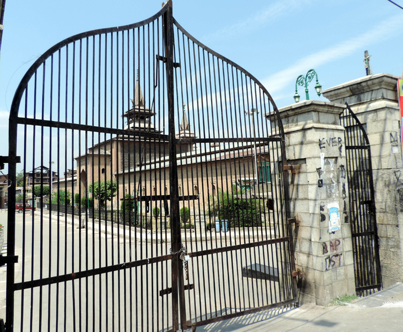 Covid: Main gate of historic Jamia Masjid in Nowhatta down town Srinagar closed