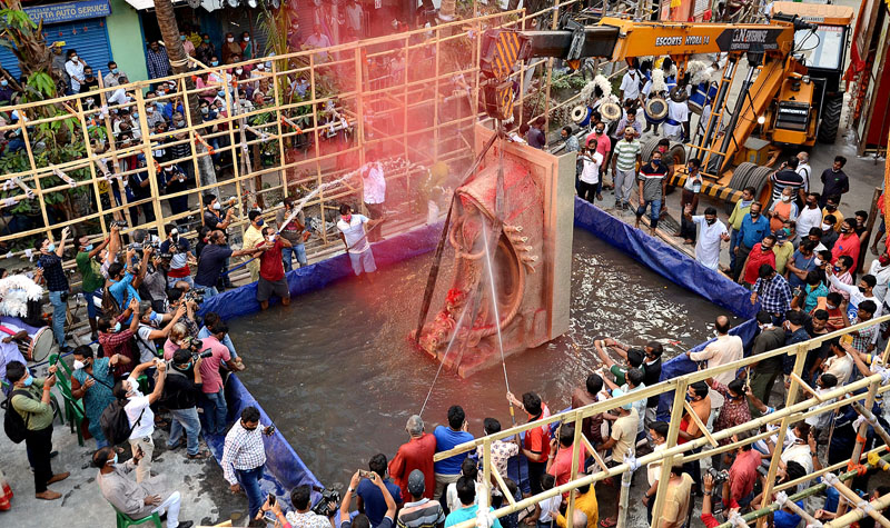 Unique Durga idol immersion in Kolkata by Tridhara Sammilani