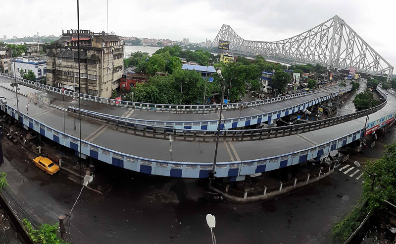 Roads in Kolkata wore a deserted look on the second day of lockdown on Friday