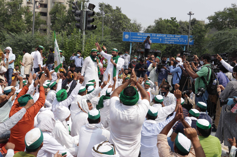 Farmers under the banner of Bhartiya Kisan Union staging a Chakka Jam in Noida