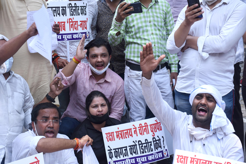 Indian Youth Congress activists demonstrate outside Rajnath Singh residence