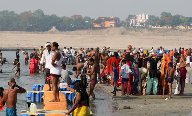 Devotees take holy dip in Ganga during anti-Covid lockdown in Prayagraj