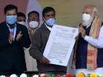 Assam: Naredra Modi distributes land patta to landless people during public meeting