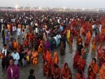Chhat devotees paying obeisance to rising sun at the Ganges in Patna